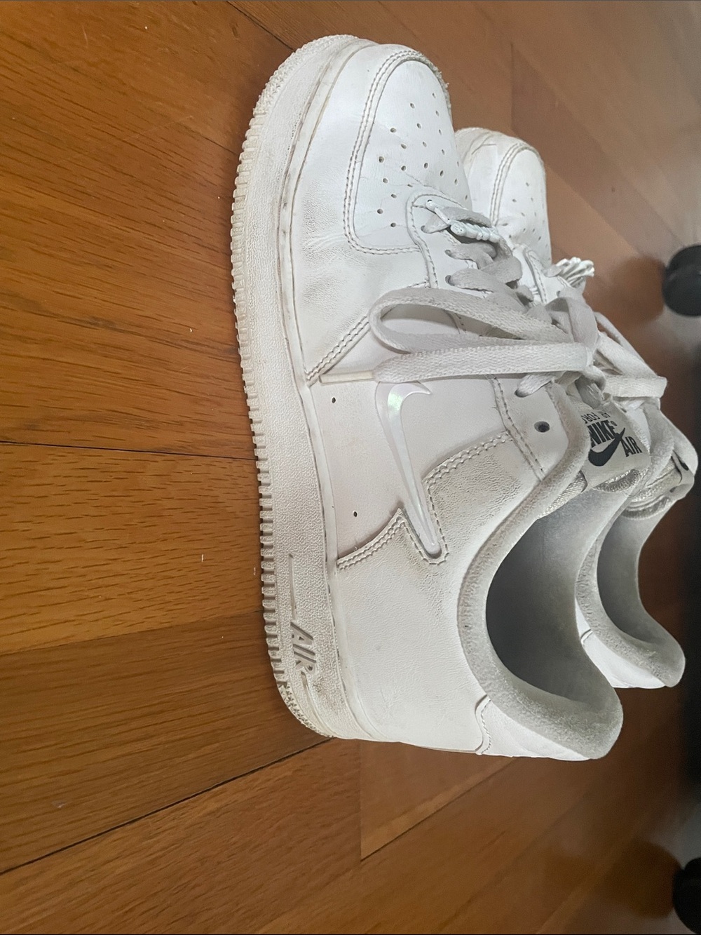 Nike White Low-Top Sneakers with Iridescent Swoosh